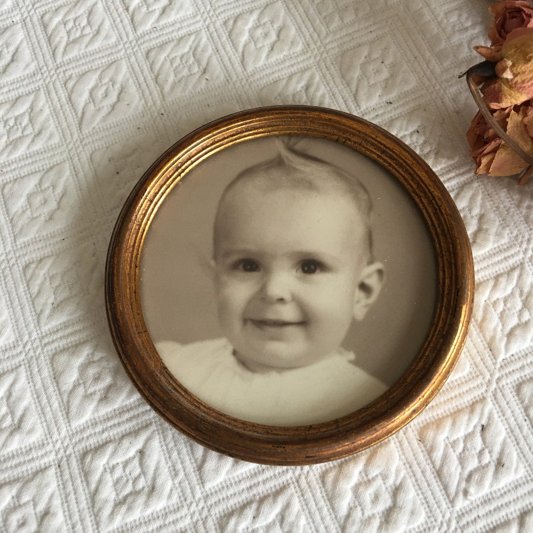 Vintage Round Gold Wood Frame With Vintage Baby Picture. Paper on Back of Frame With Wire Hanger