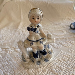 Vintage Capodimonte Girl Reading a Book Sitting on a Fence. Italian Porcelain Blue and White Figurine of Young Girl. Gold Detailing.