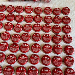 Vintage Choose 100 Coke Classic Coca Cola Bottle Caps. Repurpose in Crafting Projects. All Red and White With Lots of Printed Information.