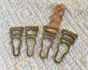 Antique 57 Garter Hardware Matched Up for You. Rubber Parts are Hard But Can Be Replaced or Buttons Used. Use for Crafting or Stocking Use.