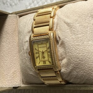 Vintage Judith Ripka Ladies Watch in Gold Tone. Water  display picture 1