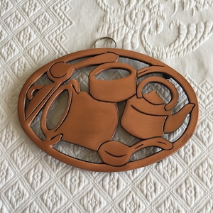 Vintage 1999 Copper Colored Trivet with Kitchen Pots and Pans. Spoons, Teapot, Kettl and Cooking Pot. Ring for Hanging at the Top.