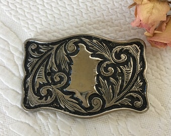 Vintage Cowgirl of Cowboy riem gesp. Sierlijke zilveren gesp met wervelende ontwerpen en geschulpte randen.