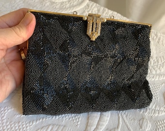 Vintage Clutch. Black Beaded purse with Diamond Shapes. Rochelle and Seed Beads in Patterned Design. Satin Lining and Enclosed Mirror.