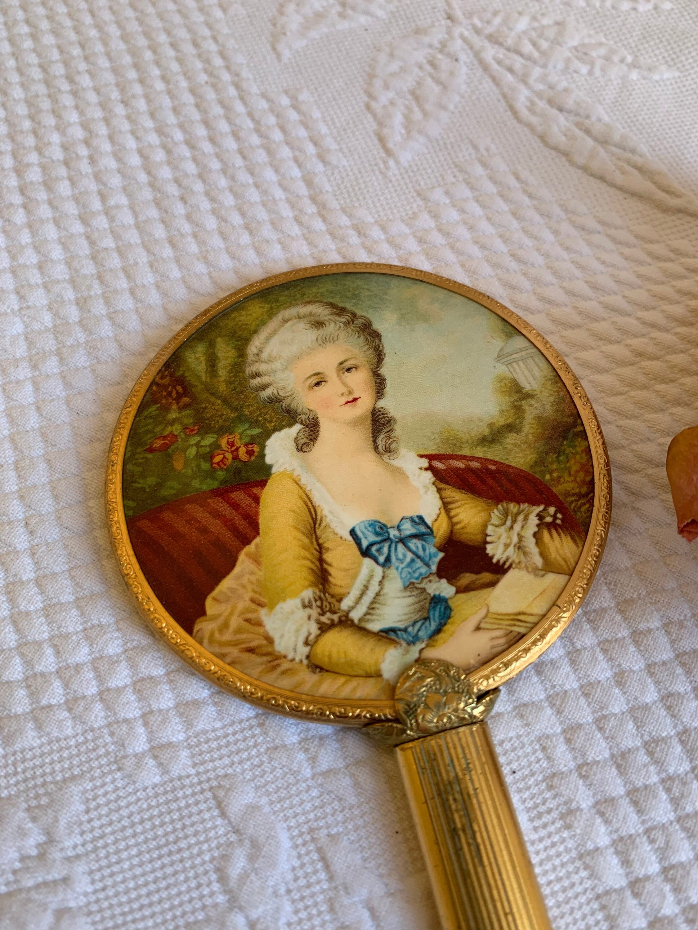 Vintage French Colonial Hand Mirror. Gold Tone Pillar Look Handle