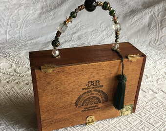 Vintage Cigar Box Purse. Hinges, Latch, Gold Ball Feet and Beaded Handle w/ Green Tassel. Beveled Mirror Inside Lid and Velvet Animal Print.