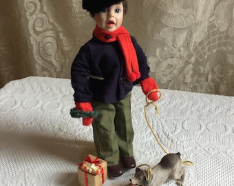 Vintage RX 2590A Boy Porcelain Doll Caroler for Christmas with His Own Doll Stand. Blue Eyes, Leather Faux Fur Hat, Mittens, Scarf, Jacket.