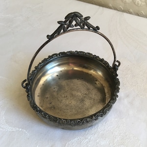 Vintage Silver Plate Bowl with Top Swing Handle. Swirling Designs Around Edge. Swing Top Handle. Quadruple Plate.