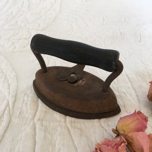 Vintage Cast Iron Child&#39;s Toy Iron. Stationary Wooden Handle. Small Replica of a Large Iron. Great for Display.