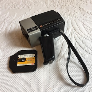 Vintage Anscomatic SC/91. Super 8-cartridge filmdisc. 15 mm optische lens. Filmcamera.  Geweldig voor vintage display of om te gebruiken.