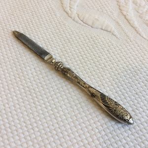 Vintage Silver Plate Fingernail File with Embossed Handle. Use or Display This Vintage Nail File.
