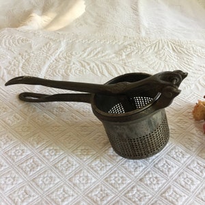 Vintage Metal Potato Masher or Ricer. Vintage Kitchen Utensil for Display or Use.