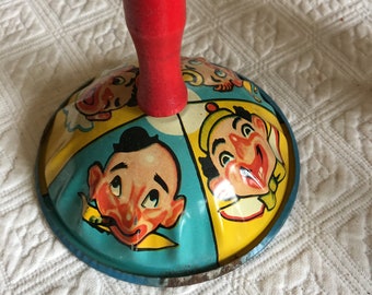 Vintage Noise Maker Bell Type Clown Noise Maker. Red Wooden Handle and Tin With Metal Clapper. 4 Pictured Clowns. Collectible Noise Maker.