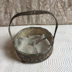 Vintage Divided Glass Candy and Nut Dish in Silver Plate Holder with Top Stationary Handle Holder with Molded Designs of Country Scenes.