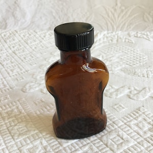 Vintage Amber Brown Medicine Bottle. Black Screw-On Top. Unique Shaped Bottle.