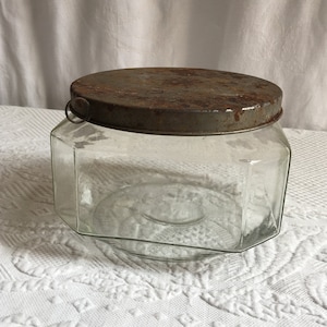 Antique Octagon Shaped Glass Jar with Tin Lid with Ring Side Handle. Charming Jar for Display or Use.