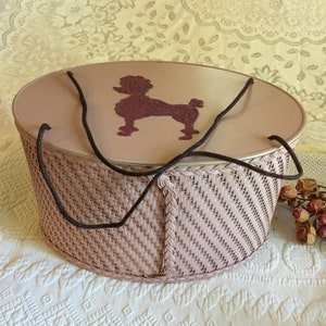 Vintage Oval Pink Sewing Box With Pink Glitter Poodle on the Top and Brown Cord Handles. Wonderful Storage Box or Sewing Box.