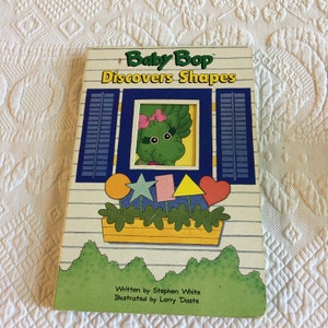 Vintage 1993 Baby Bop descobre formas. Livro de bebê com página de papelão de Stephen White. Ilustrado por Larry Daste, Formas Abertas.