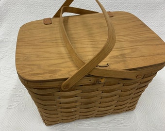 Vintage 1986 Longaberger Picnic Basket with Pie Protection Insert and Brochure. Double Top Swing Handles. Leather Hinges and Wood Latch.