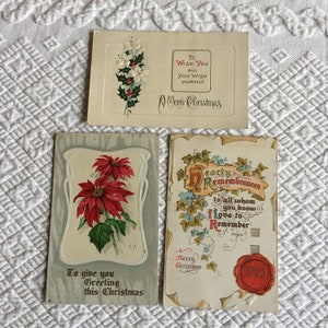 3 cartes postales de Noël antiques victoriennes. 1915 et 1916. 3 timbres George Washington d’un cent. Décorations de Noël Afficher des cartes postales.