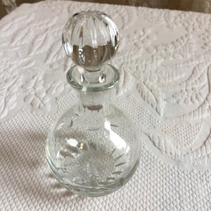 Vintage Perfume Bottle. Clear Crystal Etched Floral Perfume Bottle with Glass Stopper. Round Bottle With Round Fluted Stopper and Neck.