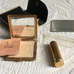 Vintage Dorset Fifth Avenue Makeup Compact Purse. Lipstick, Powder, Mirror and Comb in Snapping Leather and Brass Purse Case.