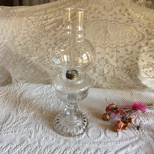 Antique Clear Glass Oil Lamp With Hurricane Shade. Decorative Fluted Designs on Top, Pedestal, Base. Victorian Oil Lamp. Brass Neck.