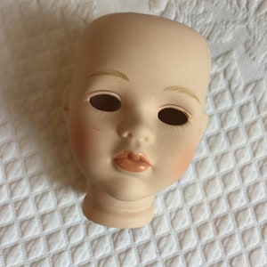 Vintage Girl Face Doll Head Marked TL043. Hand Painted Lips, Eyebrows, Eyelashes and Crease in Eye. Great for Doll Making or Display.