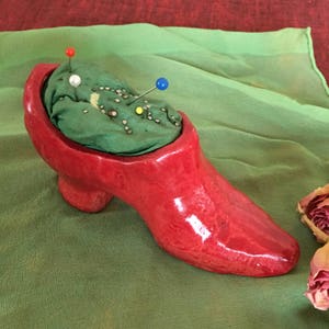 Vintage Red Ceramic Shoe Pin Cushion. Old Pin Cushion in a Red Ceramic Boot Style Shoe.