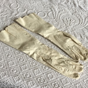 Vintage Alexette Bacmo Kid Leather Gloves. Size 7 Gloves with Three Rows of Three Lines of Stitching on Back of Hand.