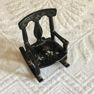 Vintage Renwal Miniature Rocker. No. 65 Plastic Black Rocking Chair with Embossed Designs and Painted Flowers on Sear. Doll House Furniture.