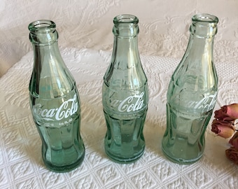 Vintage Coca Cola Single Empty Bottle, Green Glass. Choose: Kinston NC, No Marking, or 1960s Cursive on Both Sides and Molded Details.