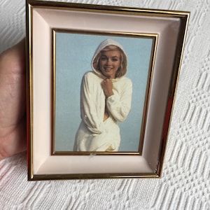 Vintage Marilyn Monroe Picture in Brass and White Shadow Box Frame with Black Flocked Backing and Tabletop Stand. Curved Inside Frame.
