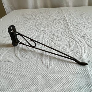 Vintage Wrought Iron Swing Wall Bracket Planter Hanger. S Decoration on Wall Hanger. Swings from Side to Side.