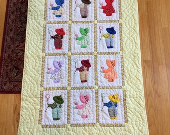 Vintage Baby Quilt with Sunbonnet Sue and Overall Sam Blocks. Sue is Holding a Tulip and Sam Holds a Balloon. Charming for Baby or Girl.