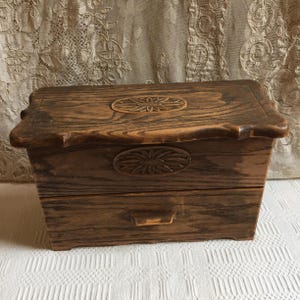 Vintage Faux Wood Plastic Dresser Box for Storage and Keepsakes. Top Opens and Drawer Opens to the Front. Ovals with Sunflower Designs.