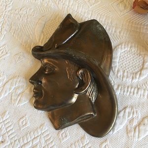 Vintage Bronze Fireman Face and Hat Plaque. Tropar Bronze Ornament with Nut and Bold in Back Middle. Car Ornament.