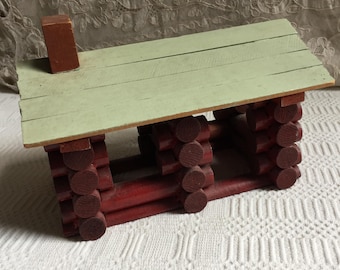 Antique Log Cabin Glued Together Using old Lincoln Logs Painted Red. Note Attached to the Cabin Dated 1884 Written with a Dip Pen in Red.