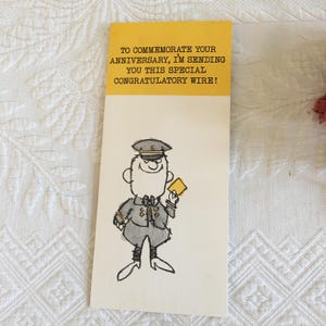 Carte de voeux vintage des années 1960. Envoyé à un employé de Western Union Telegraph. Fil métallique avec une étiquette en papier pour félicitations.