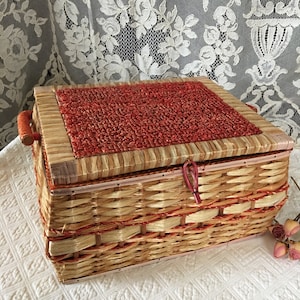 Vintage Sewing Basket With Red Satin Lining. Tufted Inside Lid With Pearls. Swing Side Handles. Woven Sisel Basket With Looped Top.