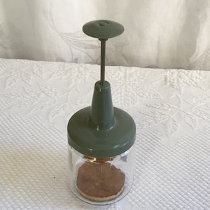 Vintage Food Chopper. 1950 Androck Chopper. Glass Jar W/ Plastic Screw On Lid W/ Blades Attached to Palm Push Chopper. Measurement Marks.