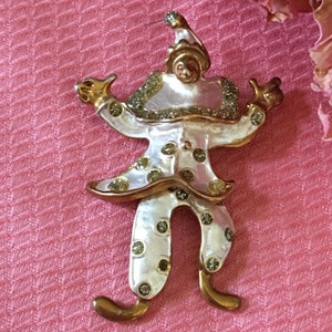 Vintage Jester With Dangling Legs Pin Brooch. The Legs Hang Loose at the Waist so The Legs Dance. Gold and Pearlized Paint Finish.