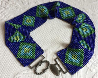 Vintage Southwestern Style Stretchy Beaded Belt w/ Diamond Shapes in Blue and Green. Locking Oval Buckle on Front. 2 3/4" Wide Stretch Belt.