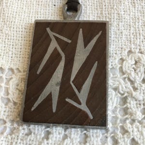 Vintage TENN 1960s Pewter Abstract Artistic Images of Person and Flower Inlaid in Brown. Signed and Marked Sweden.
