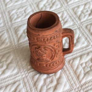 Vintage Miniature Tankard Mug. Composite Clay Look Miniature Bar Ware with Images of Knight and Lady in Relief. Great for Display.