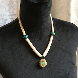 Vintage Puka Shell and Turquoise Nugget Necklace. Antler Setting for Turquoise Nugget Pendent. Magnetic Closure.