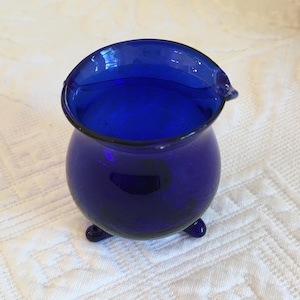 Vintage Toothpick Holder. Hand Blown Glass Toothpick Holder. Three Feet and Swirled Design on One Side.