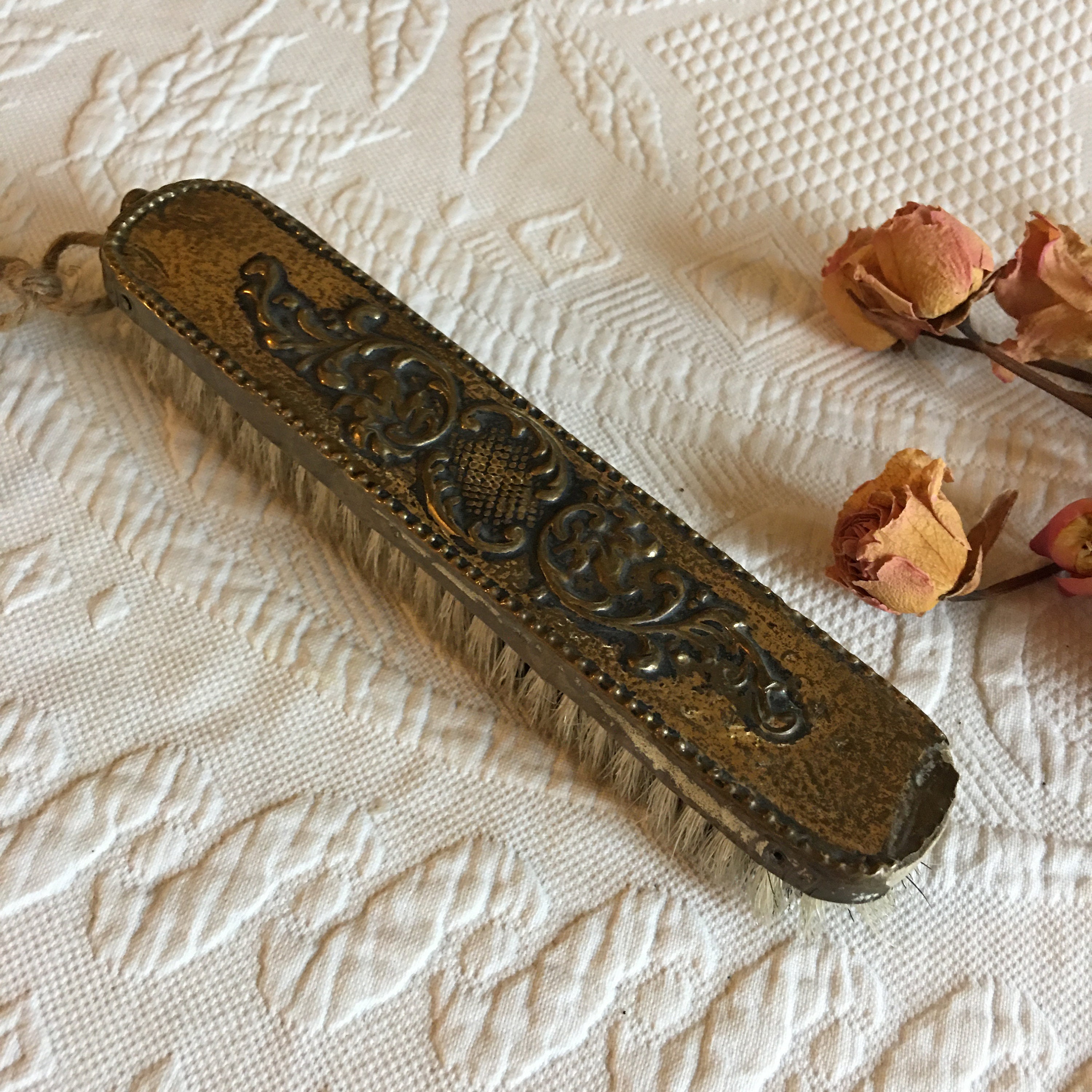 Antique Hat or Clothing Brush. Molded Brass, Wood and Natural Bristles Hat or Clothing Brush. Rope Designed Border & Fancy Swirling Designs.