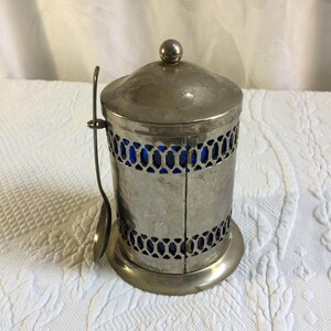 Vintage Coffee Container. Hammered Silver Plate Openwork Design w/ Lid and Spoon. Cobalt Blue Hard Plastic Liner and Spoon Holder. image 5