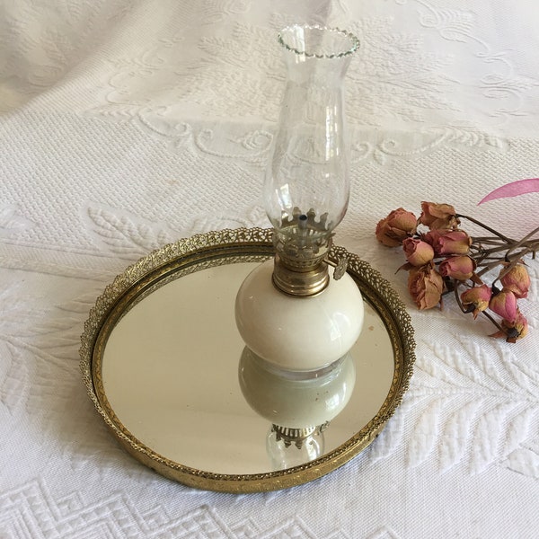 Vintage Mirror Tray. Gold Round Mirror Tray with Openwork Flowers and Leaf Designs with Tiny Lacey Scalloped Edge. Black Ridged Backing.